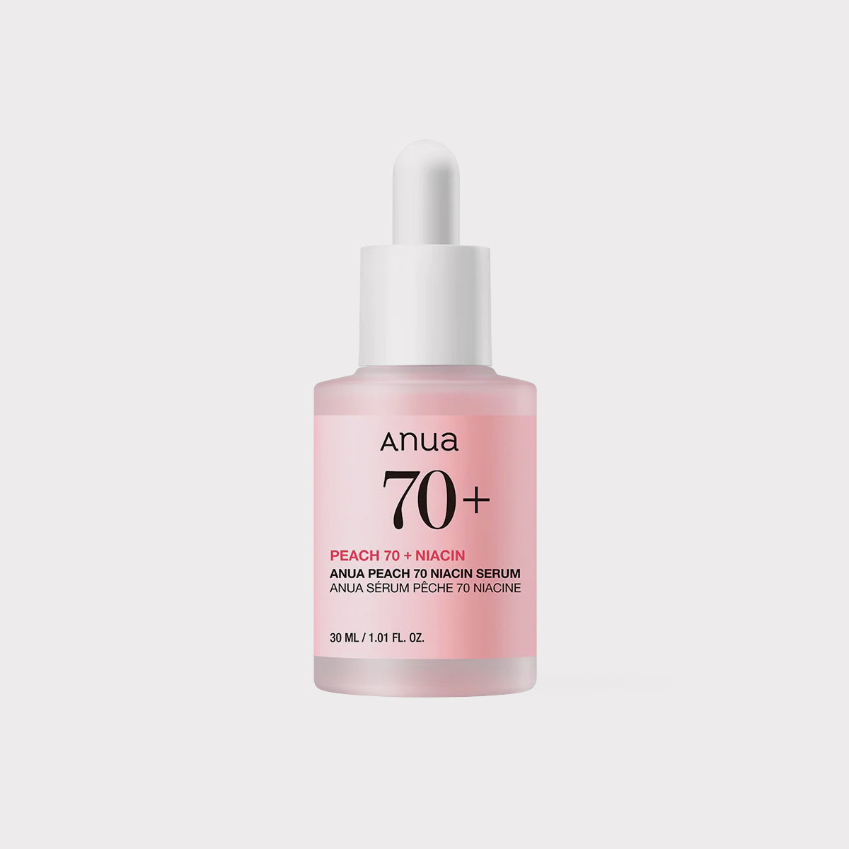 Anua 70+ serum bottle on a light gray background Anua Peach 70% Niacinamide Serum  brightening glow pore refining Korean skincare Kbeauty international shipping